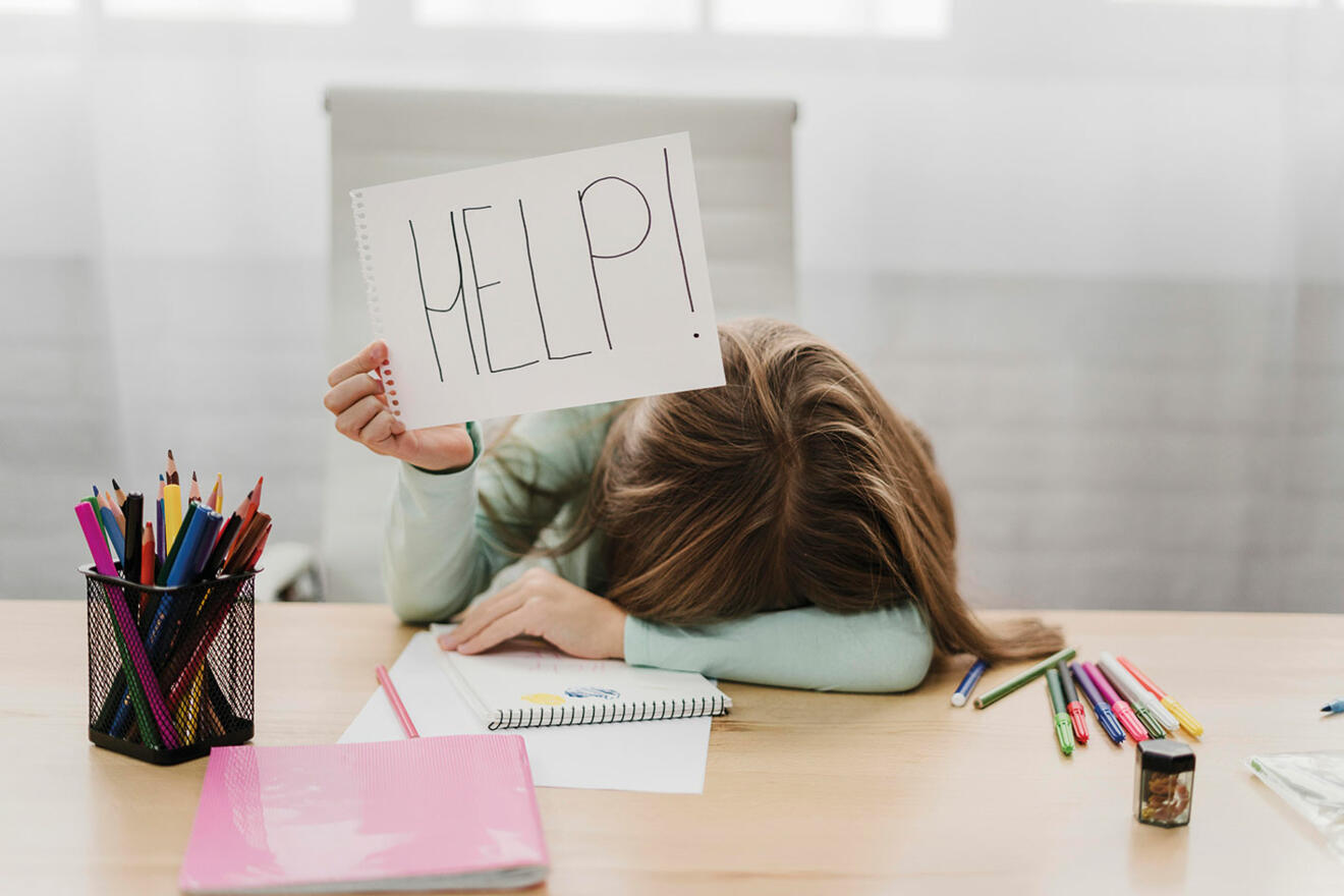 little-girl-holding-help-message-white-paper.jpg